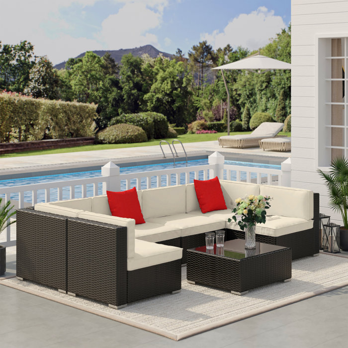 Latitude Run® 7 Piece Rattan Sectional Seating Group with Cushions